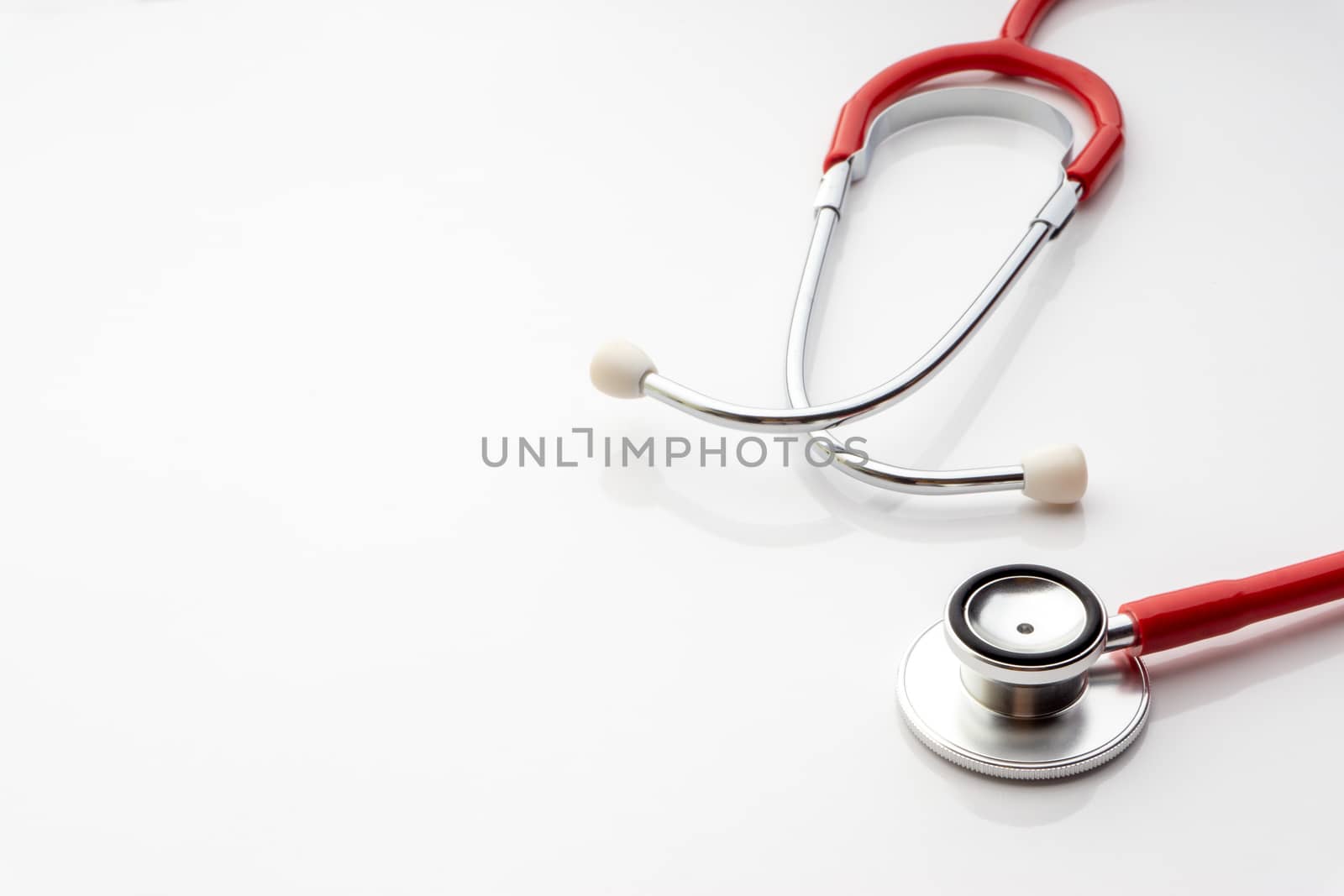 Stethoscope on white background. Healthcare dan Copy Space concept