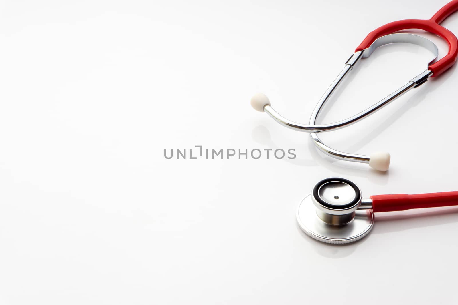 Stethoscope on white background by silverwings