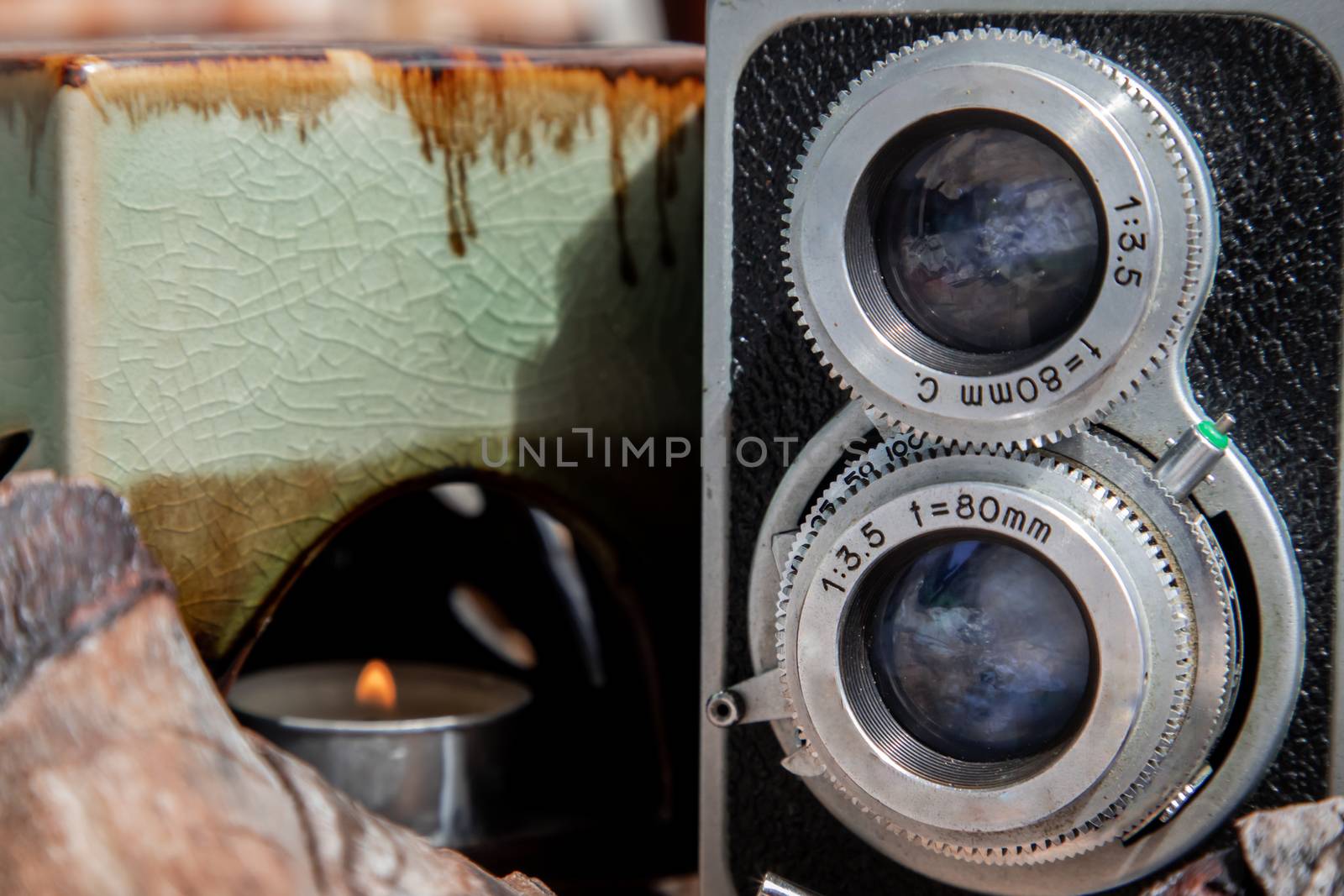 Vintage two lens photo camera on wooden background. An idea of old camera and memory, time Nostalgia.