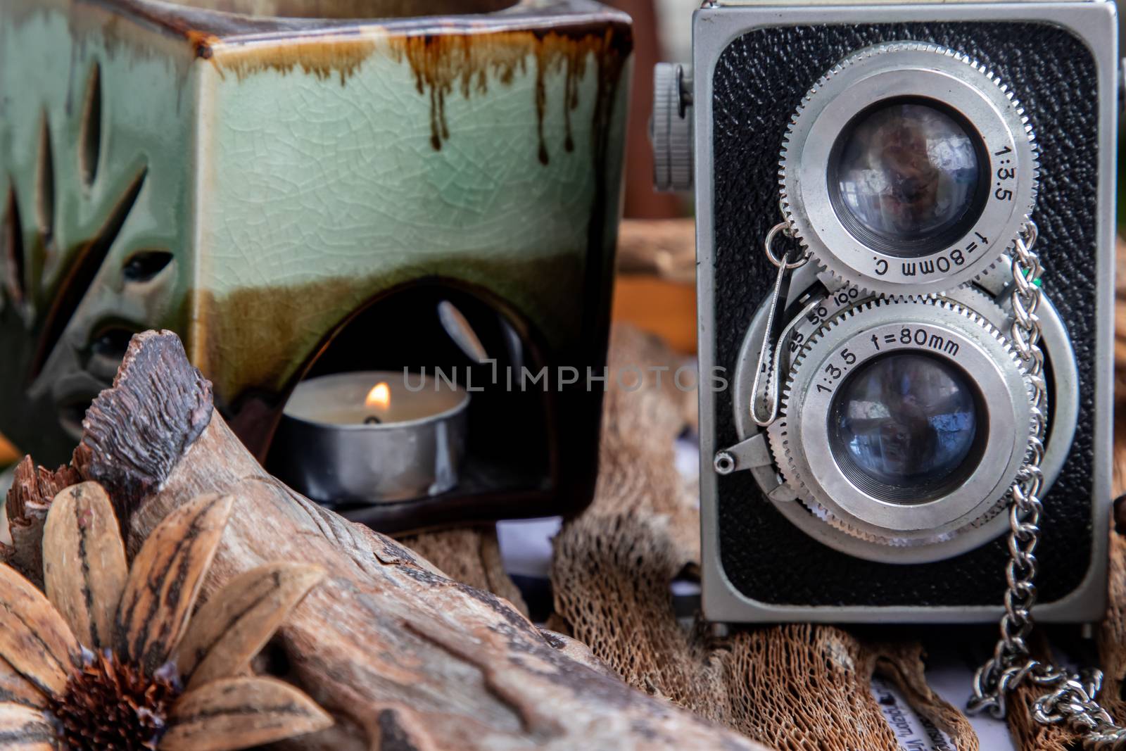 Vintage two lens photo camera on wooden background. An idea of old camera and memory, time Nostalgia.