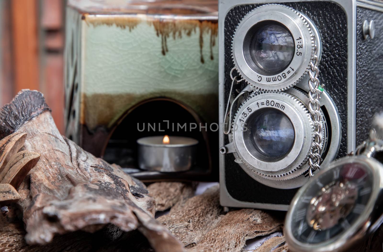 Vintage two lens photo camera on wooden background. An idea of old camera and memory, time Nostalgia.