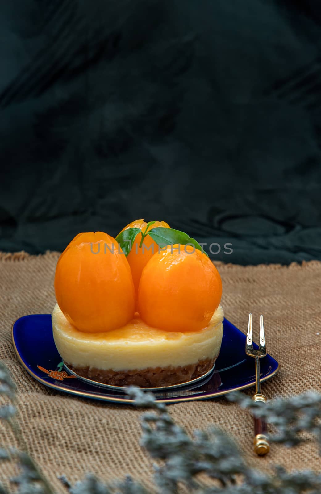 Traditional French sweet dessert : Mayomgchid tart on beautiful background. One piece, Delicious seasonal breakfast. Oblique view from the top, Selective focus.