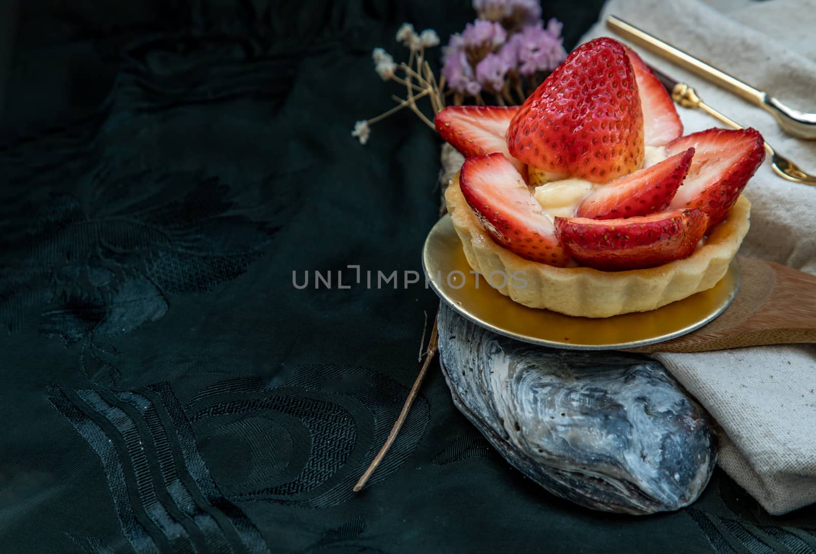 Traditional French sweet dessert : Strawberry tart on beautiful background. One piece, Delicious seasonal breakfast.  Selective focus.