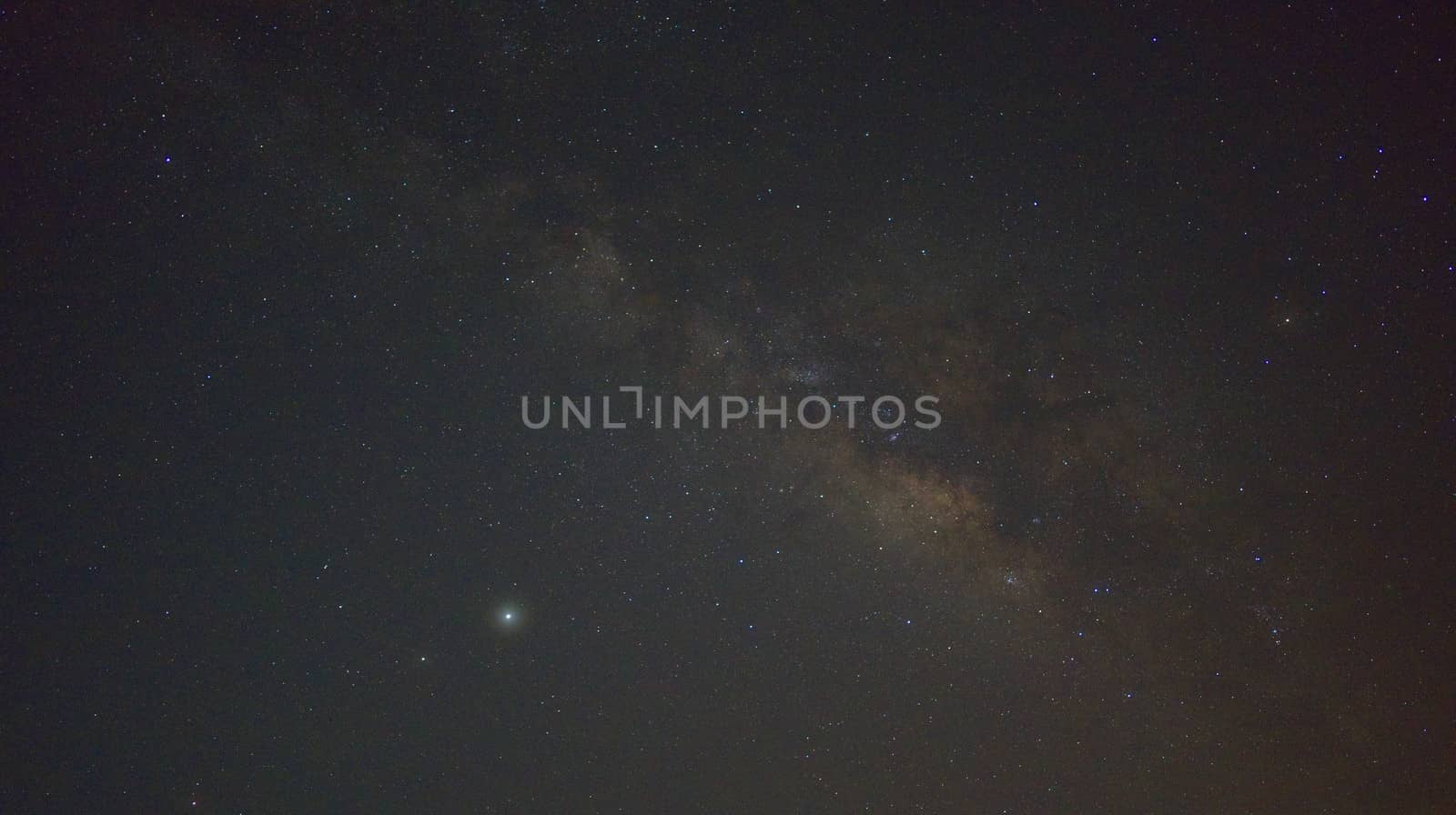 The Milky Way, the Galaxy, the Universe in the Dark Sky in Thailand.