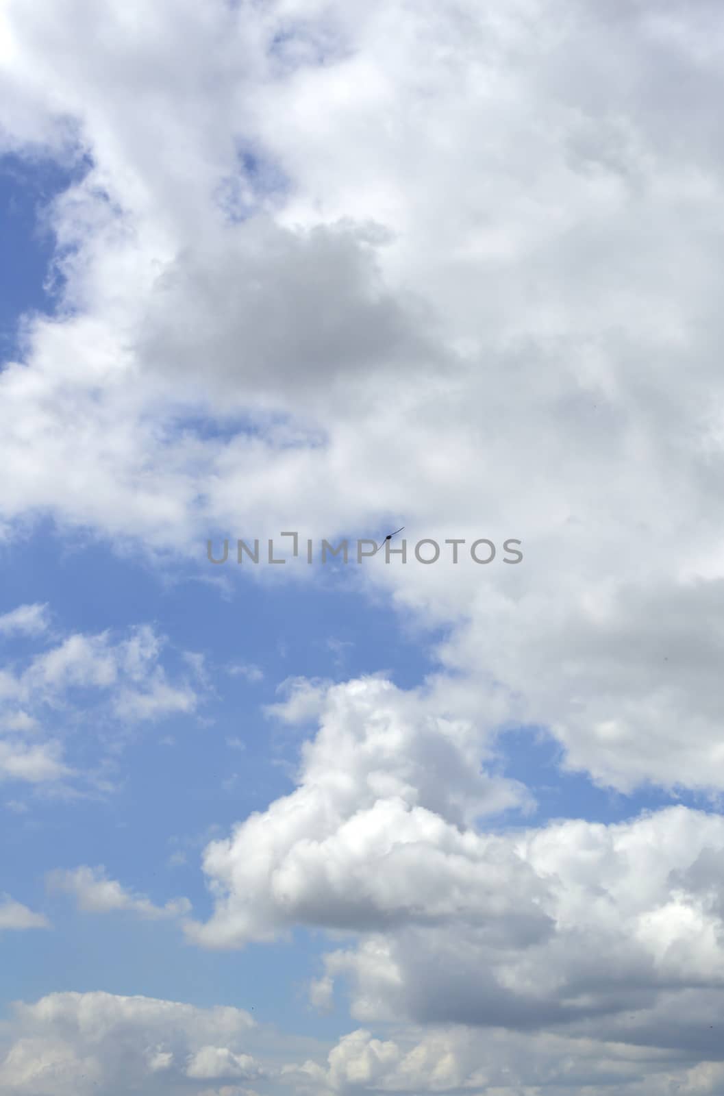 Beautiful blue sky with clouds by sergpet