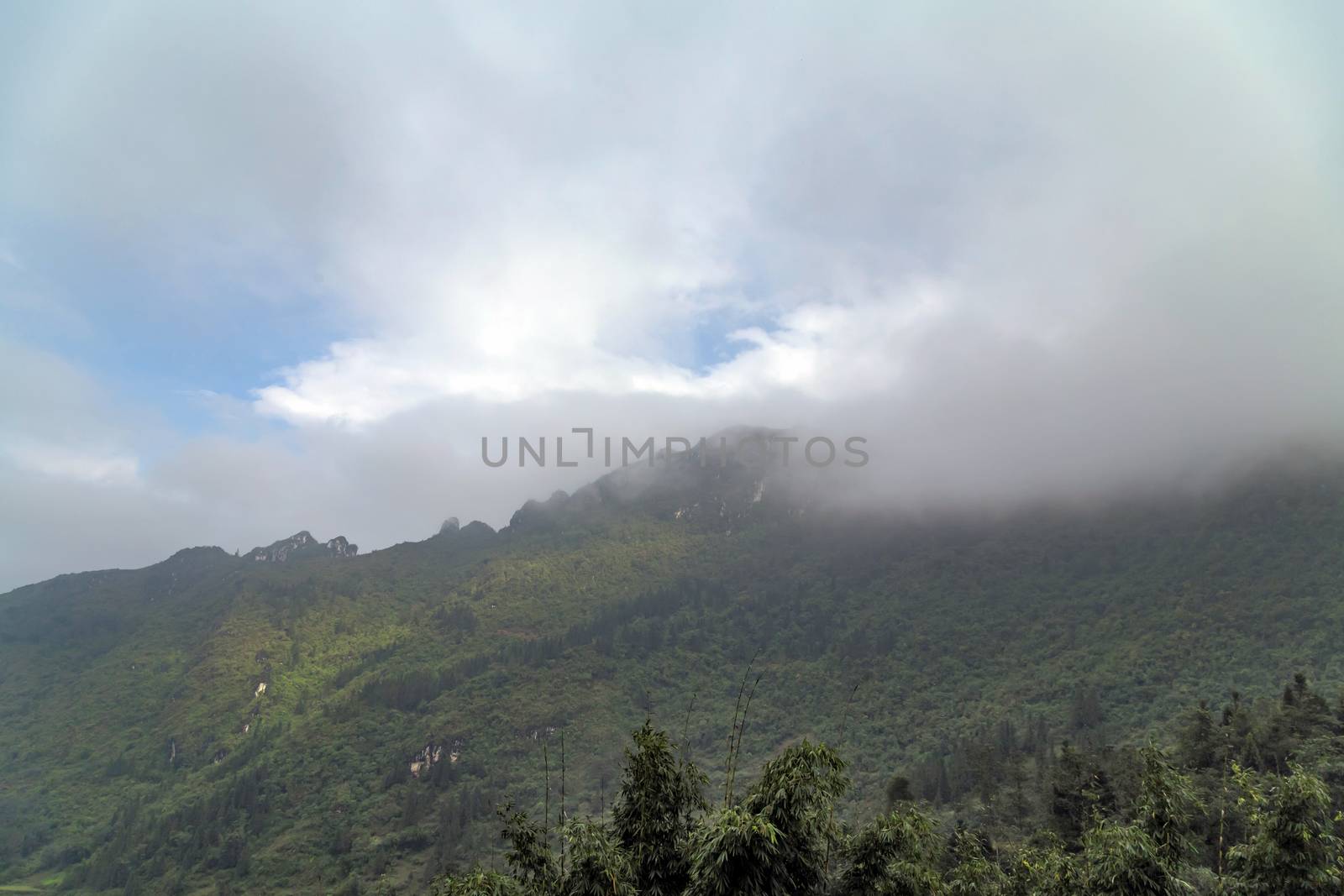Mountain in the cloud fog Lao cai province northern Vietnam by Vladyslav