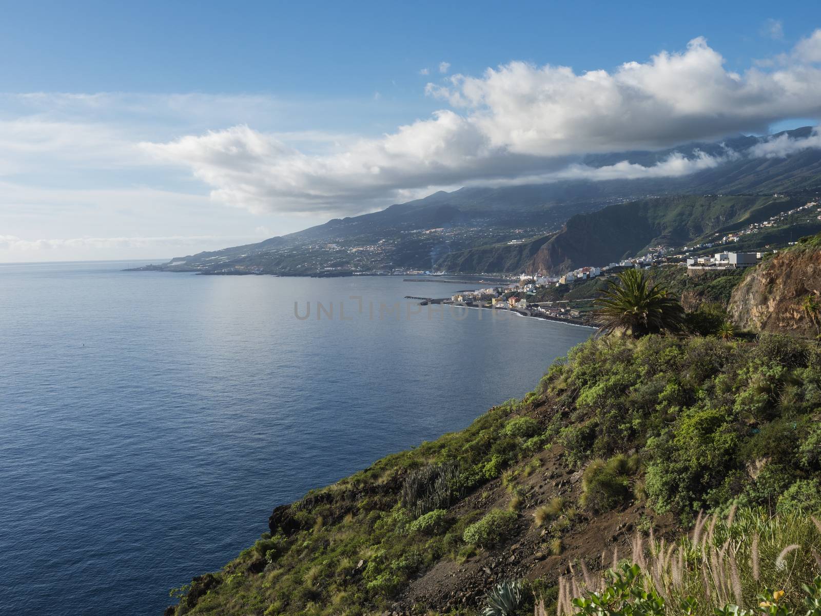La Palma, Canary Islands, view from viewpoint Mirador de San Juanito with view on Santra Cruz de la Palma and ocean. Blue sky background.