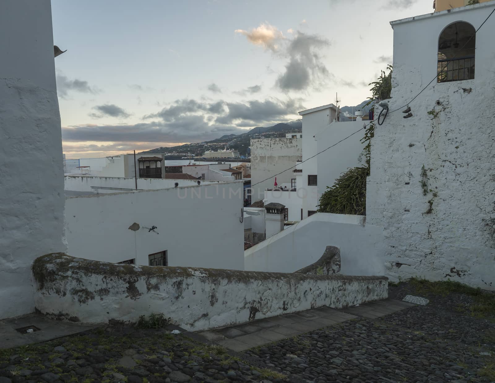 Old stone stairs with shabby white walls at the center of Santa Cruz De La Palma, La Palma Island, Canary Islands, Spain.