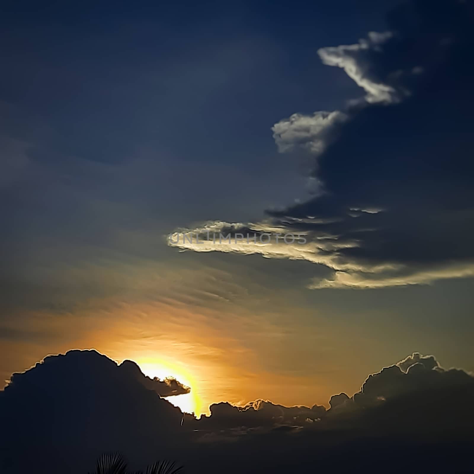 Beautiful view of sunset looks like a dragon in front of the sunset and clouds patterns view eyeopener for best imaginary background by AnithaVikram