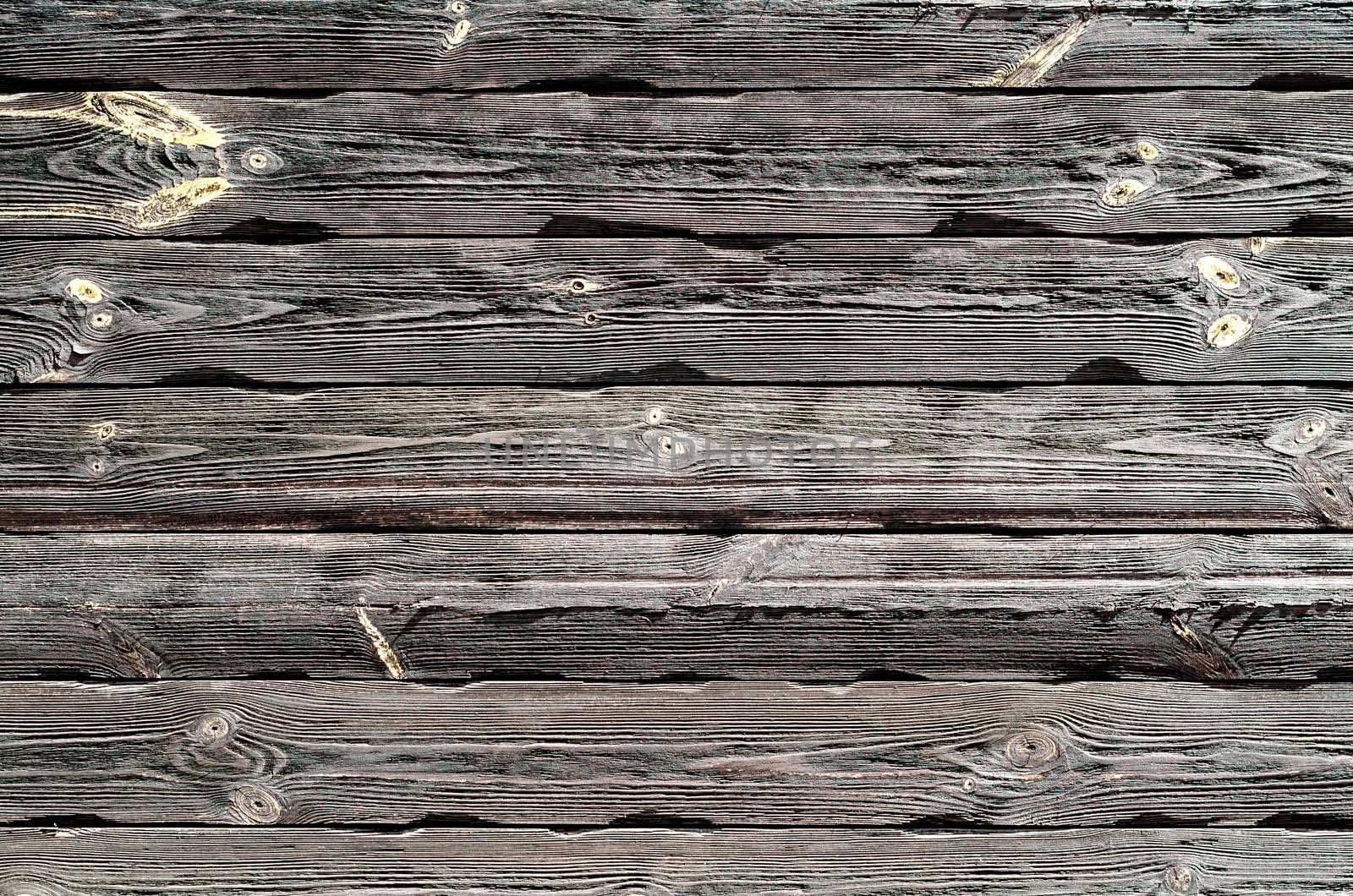 pattern old wooden planks with yellow paint close up