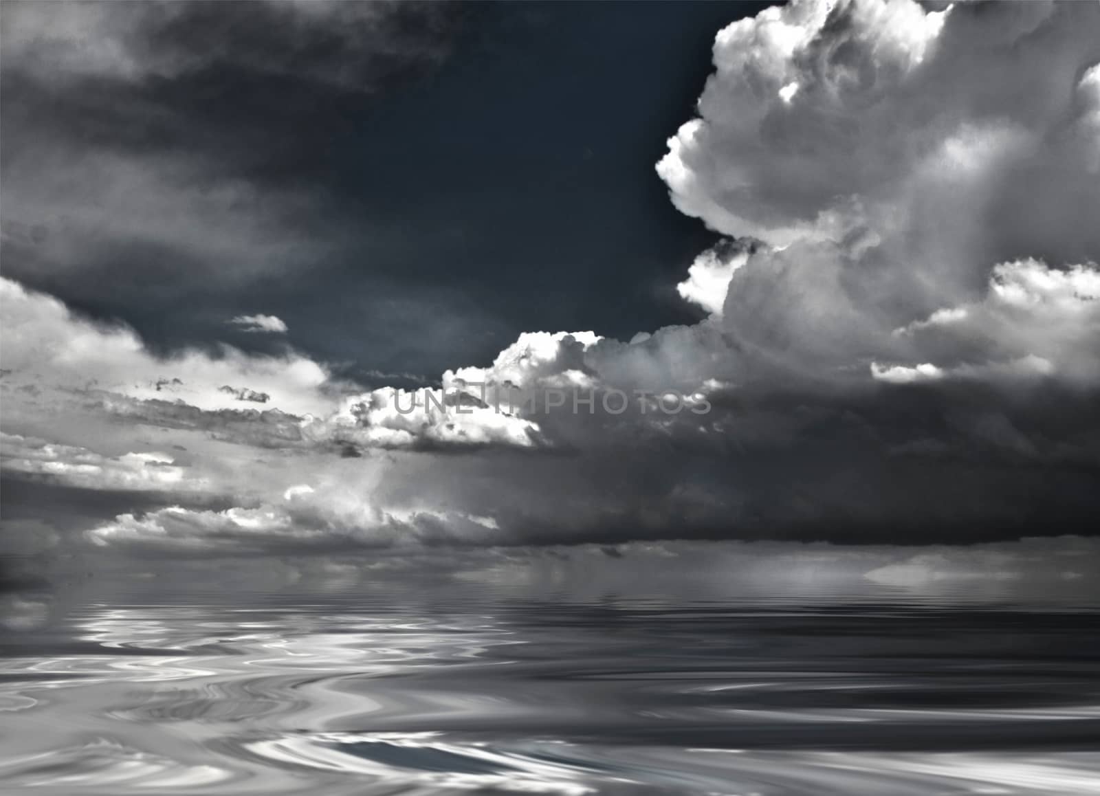 Dramatic clouds reflected in water surface
