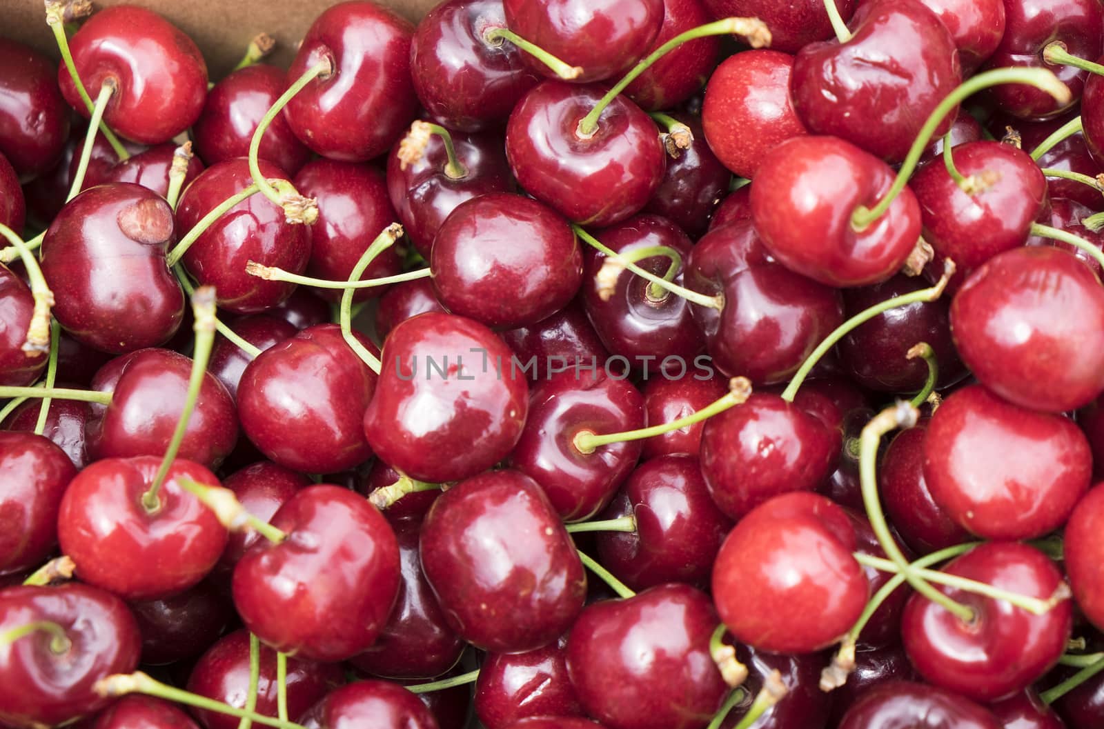 Many cherries for sale on a Farmers market