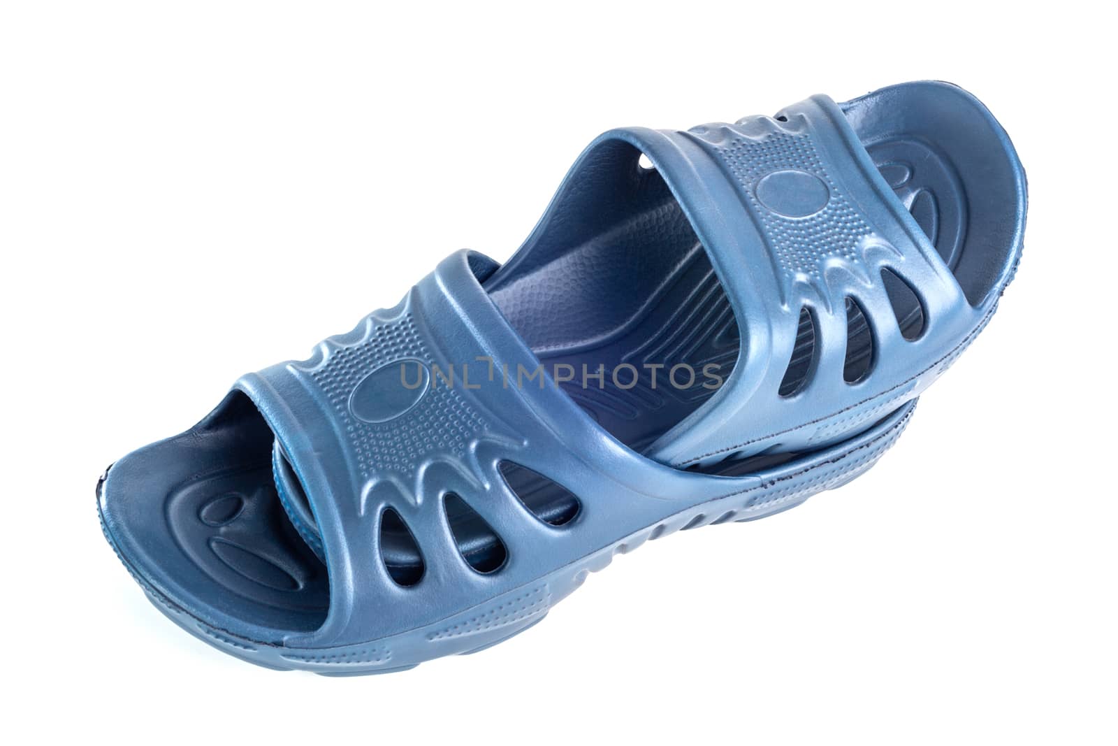 a pair of cheap durable blue rubber slippers one inside other isolated on white background.