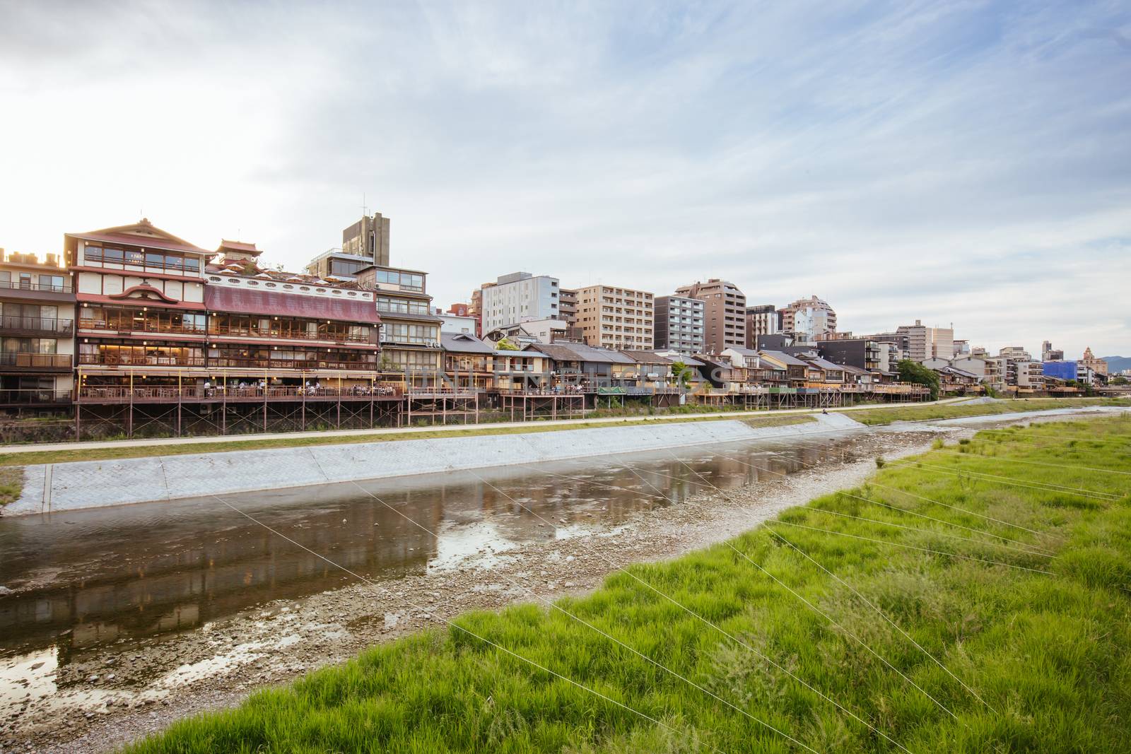 KYOTO, JAPAN - May 15 2019: Ancient houses and restaurants along Kamo river in Gion, Kyoto, Japan