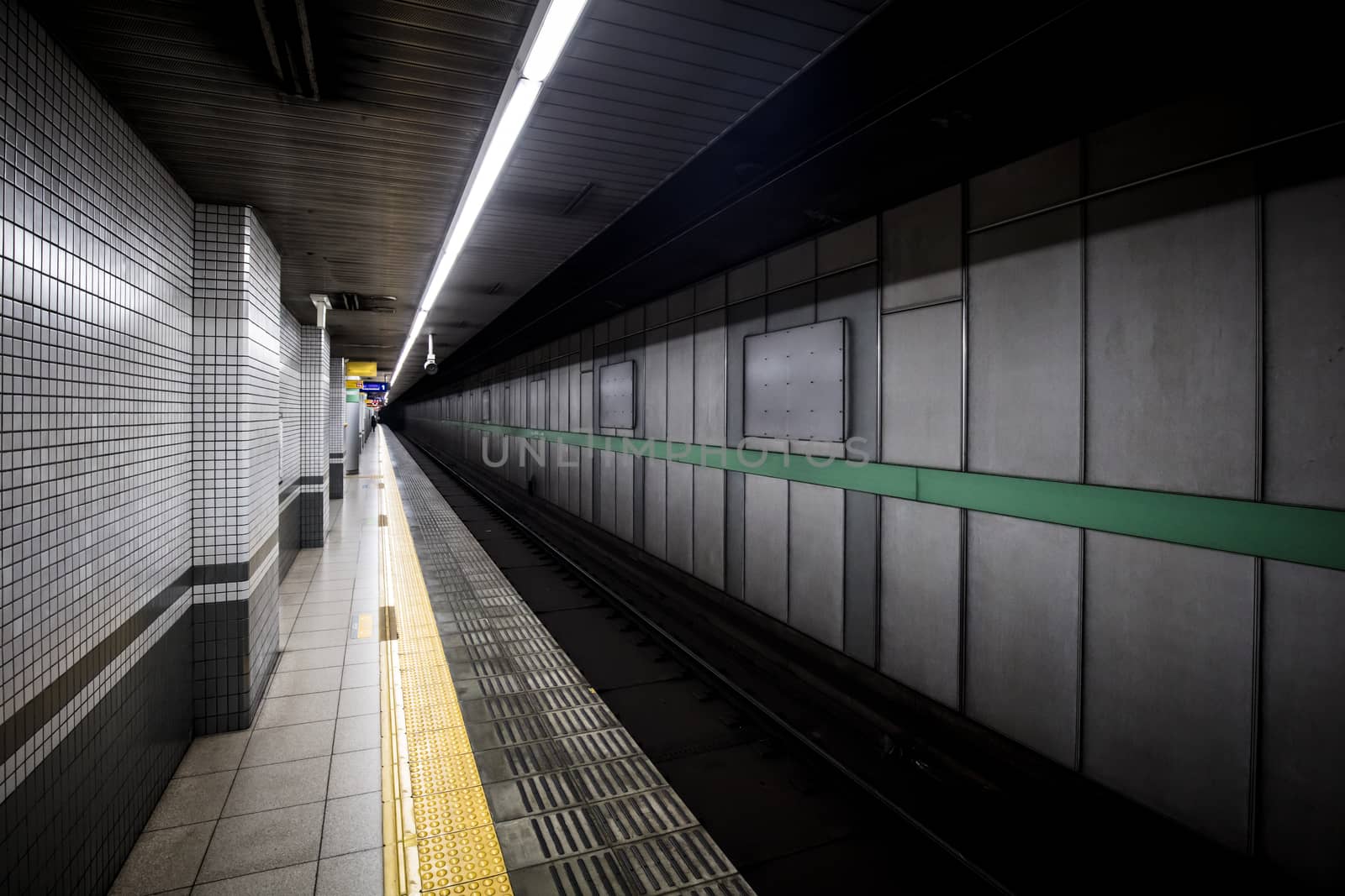 Kyoto, Japan - May 13 2019: The gritty interior and empty train platform of Sanjo Train Station in Kyoto, Japan