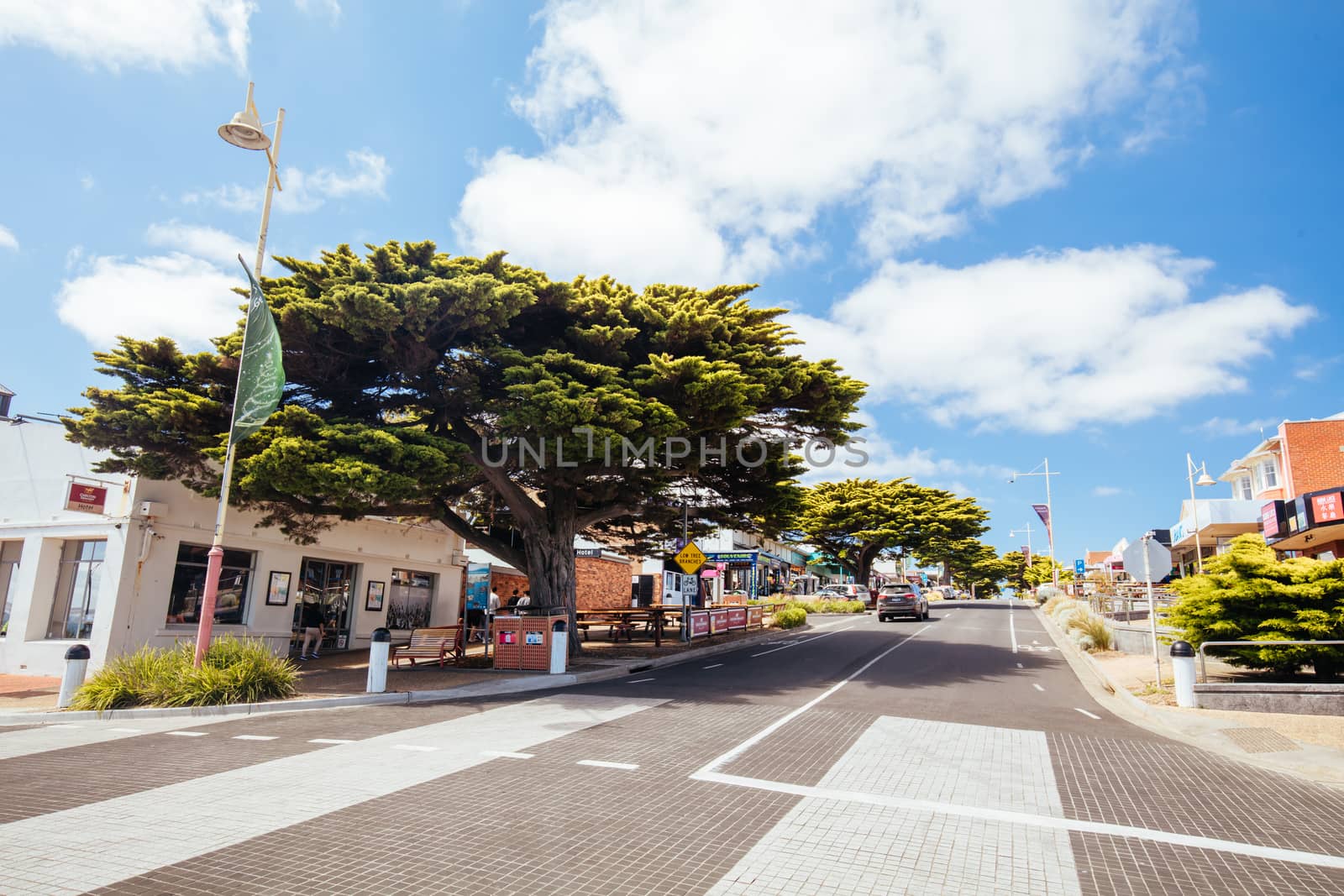 Cowes, Australia - December 8 2019: Cowes Foreshore and its iconic jetty and beach on a warm summer's day in Philip Island, Australia