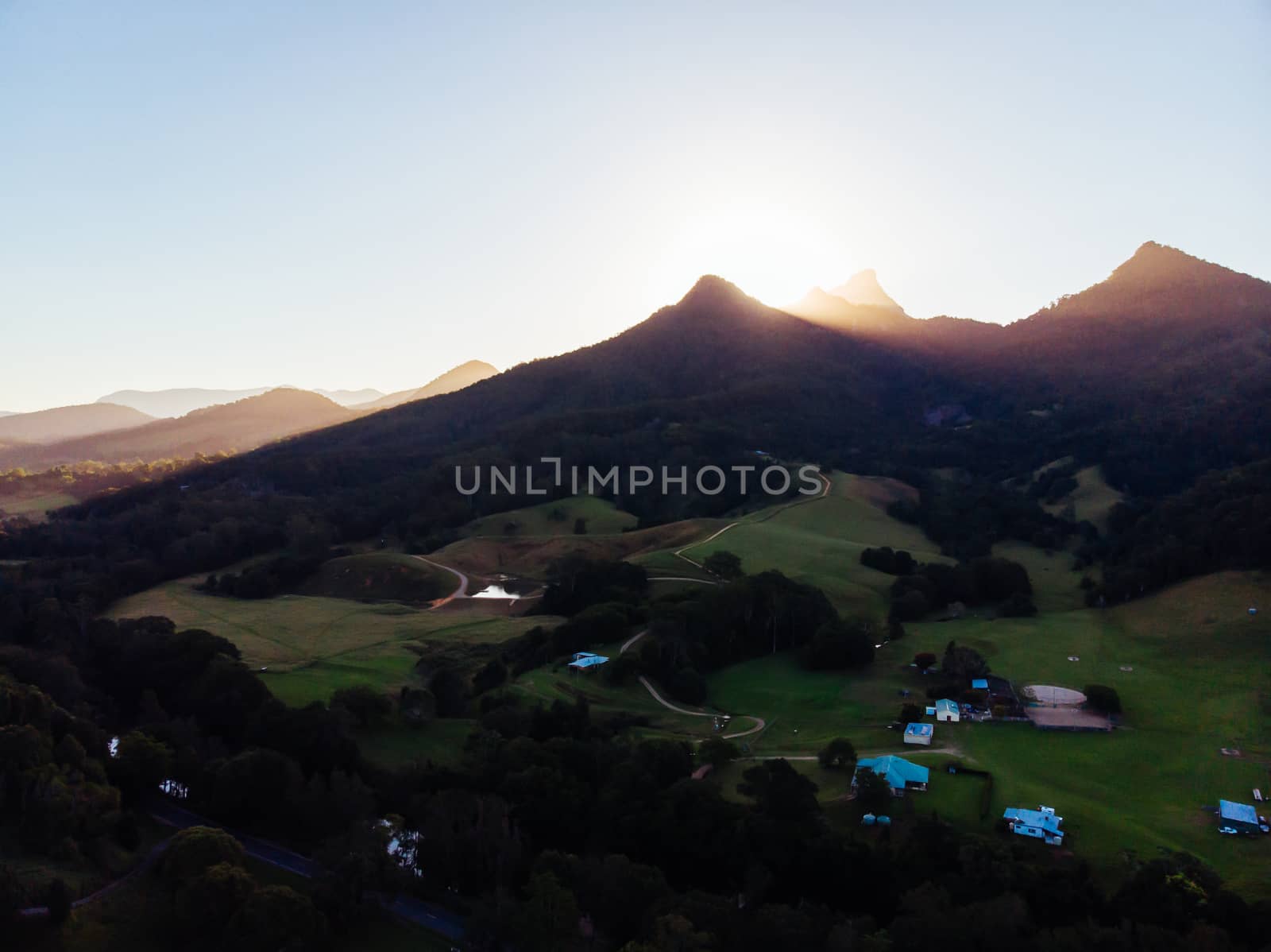 An aerial view at sunset of the rural town of Uki, near Mt Warning in NSW, Australia