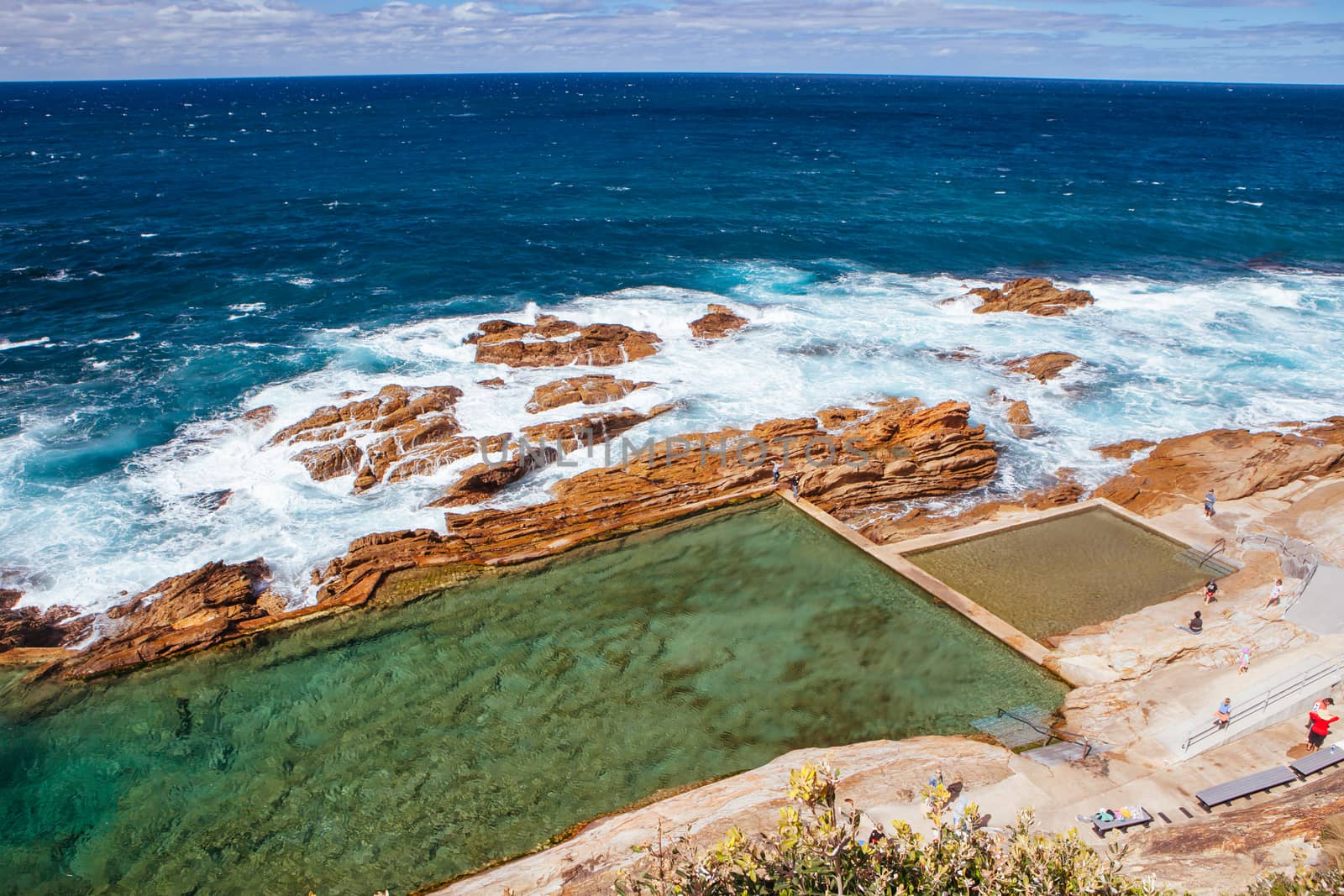 The iconic and famous Blue Pool on a cool autumn afternoon in Bermagui, New South Wales, Australia