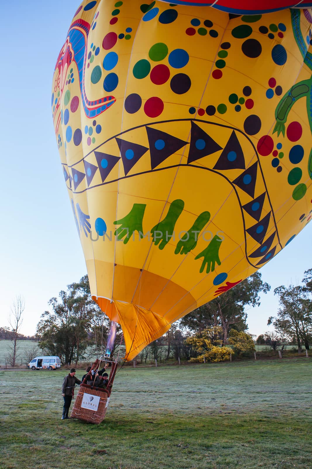 A hot air balloon being setup on a cold winter's morning in Yarra Valley, Victoria, Australia