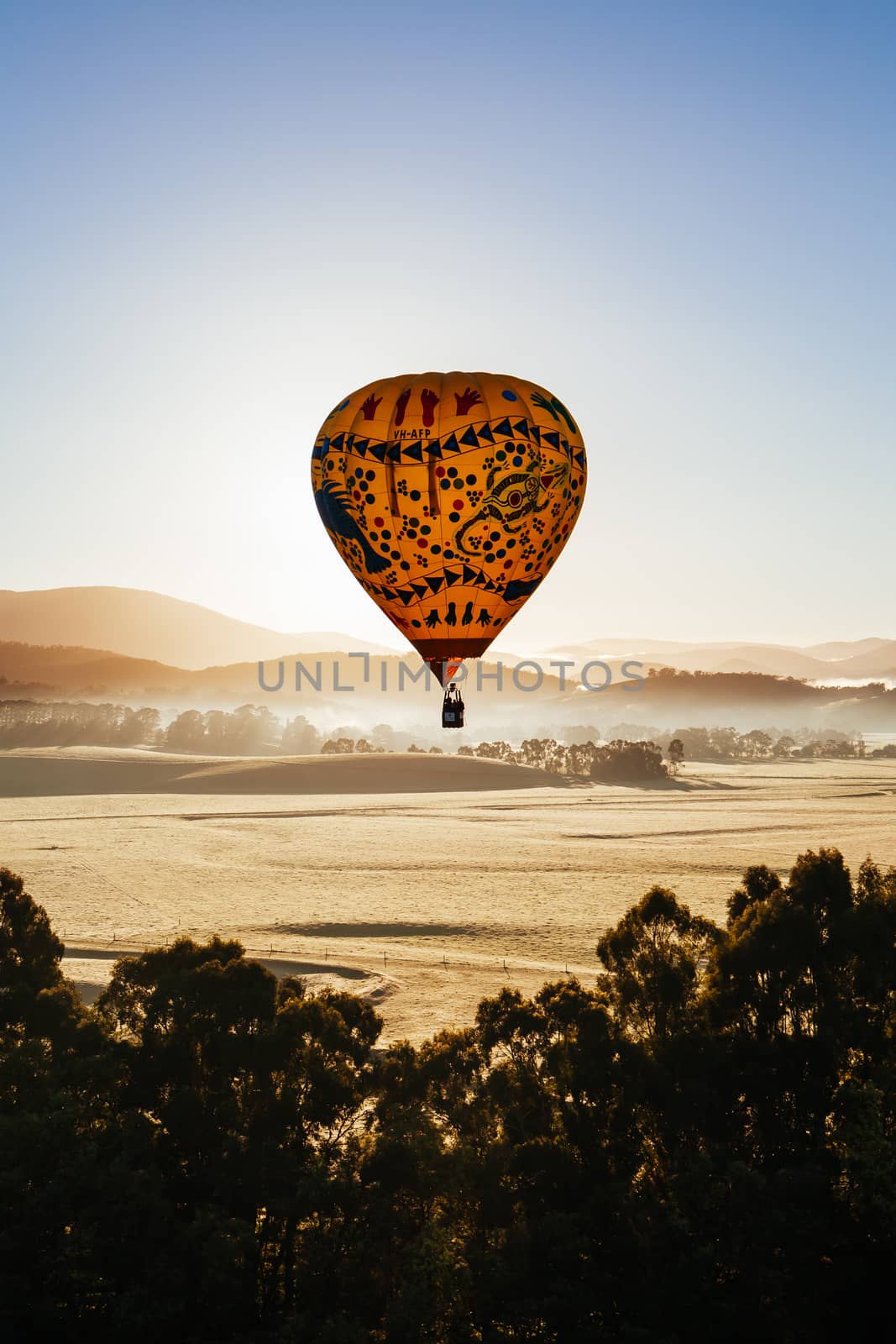 A sunrise hot air balloon flight over the Yarra Valley in Victoria, Australia