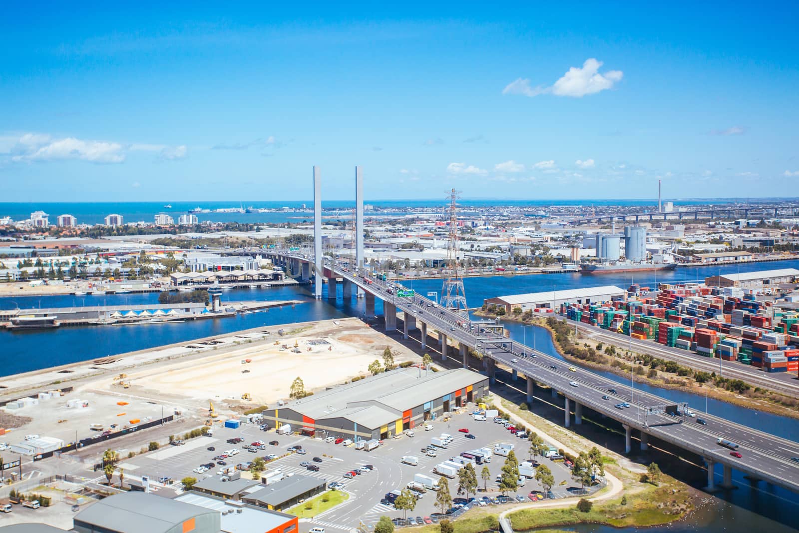 A view of Docklands and the Bolte Bridge towards Williamstown in Melbourne, Victoria, Australia