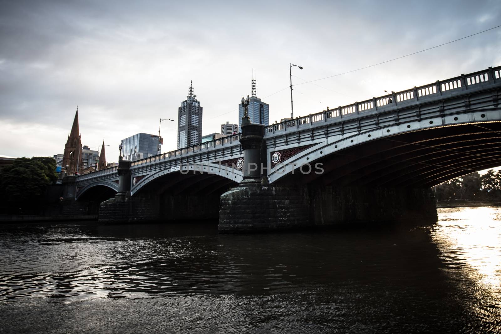 MELBOURNE, AUSTRALIA- AUGUST 15 2018 - The Melbourne skyline from Southbank and Princes St Bridge on a cool winter's morning