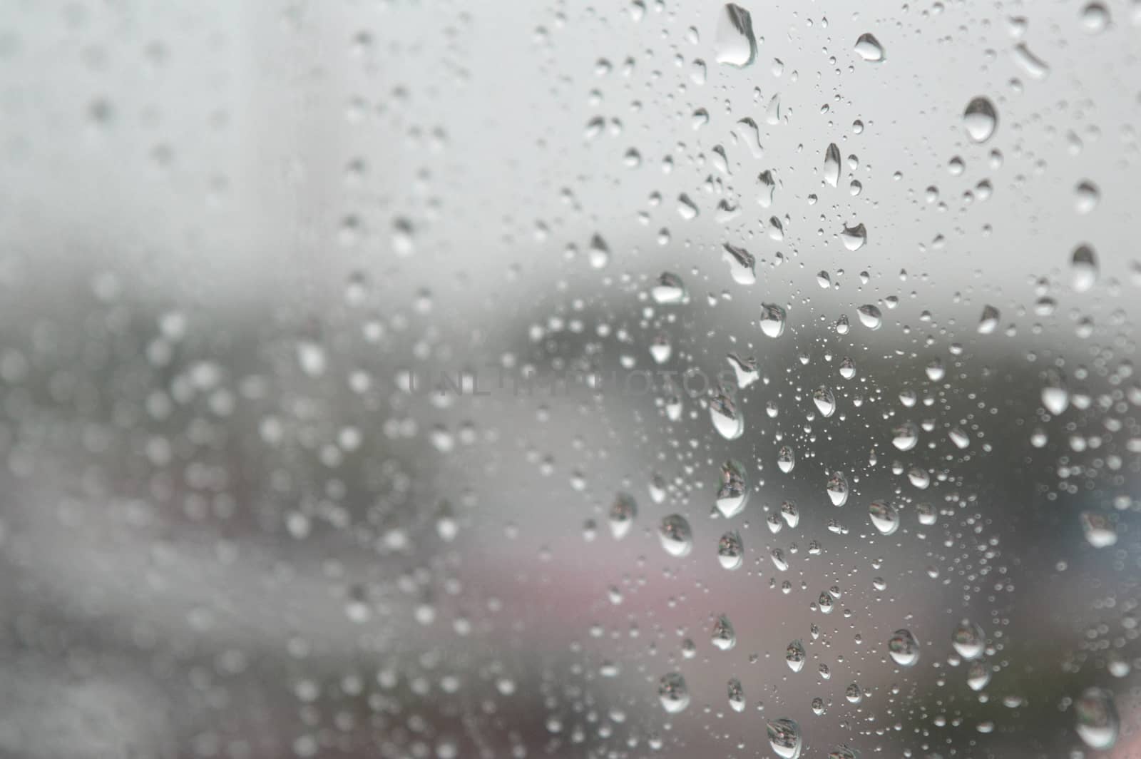 Drops of rain on the window, rainy day by sergpet