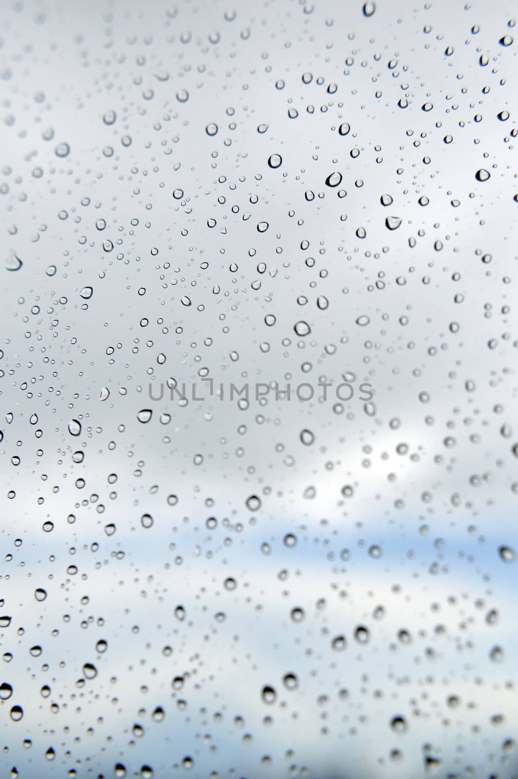 Drops of rain on the window, rainy day by sergpet