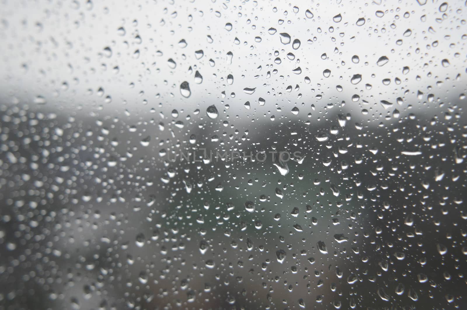 Drops of rain on the window, rainy day by sergpet