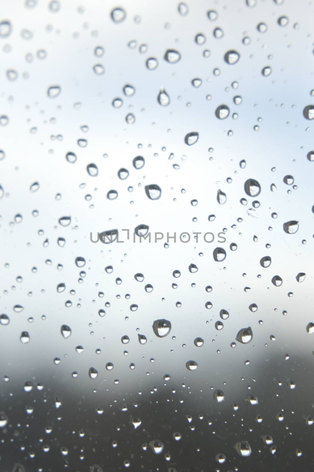 Drops of rain on the window, rainy day by sergpet