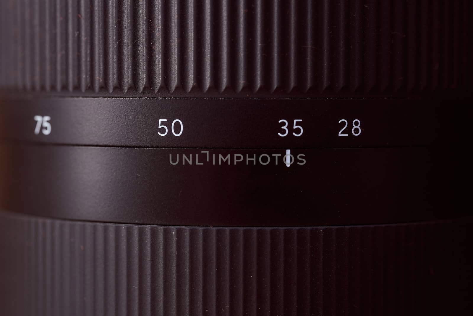 view of the focal length ring Photo lens 28-75 mm. Close-up. Very high quality photo.. High quality photo