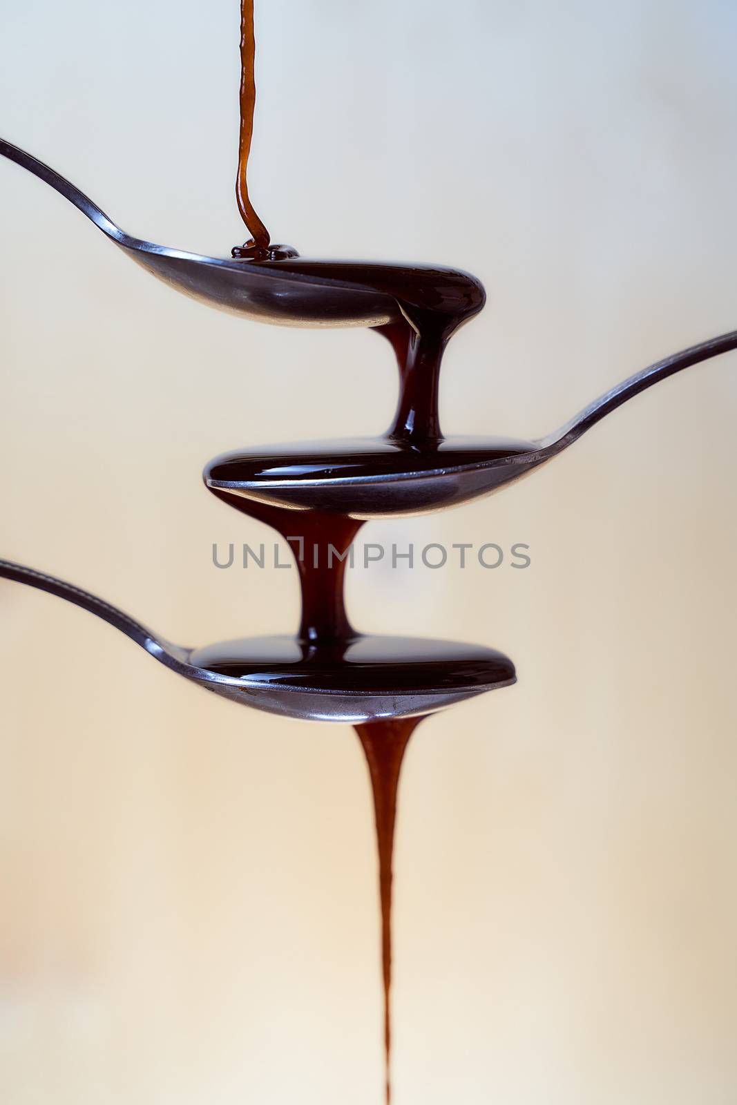 Honey in a spoon.White background