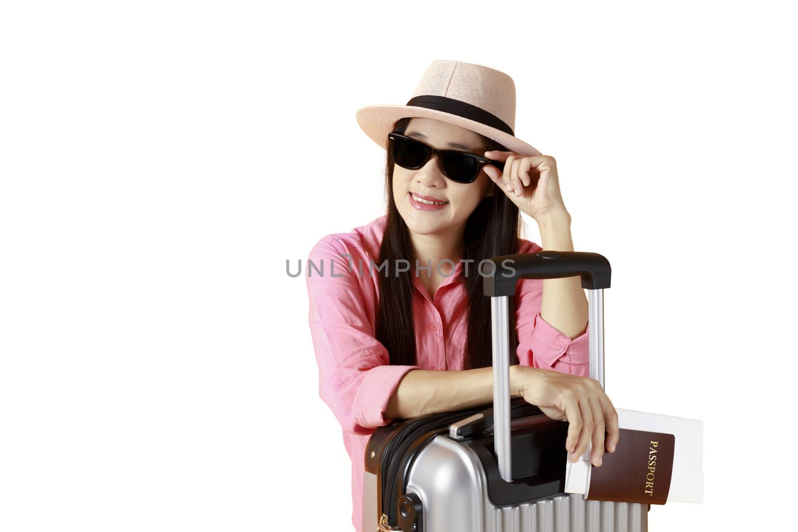 Asian women long hair wear Straw hat, sunglasses in hand holding passport book and travel bag with copy space banner. Young girl ready to travel with suitcase and passport on white background. Summer concept.