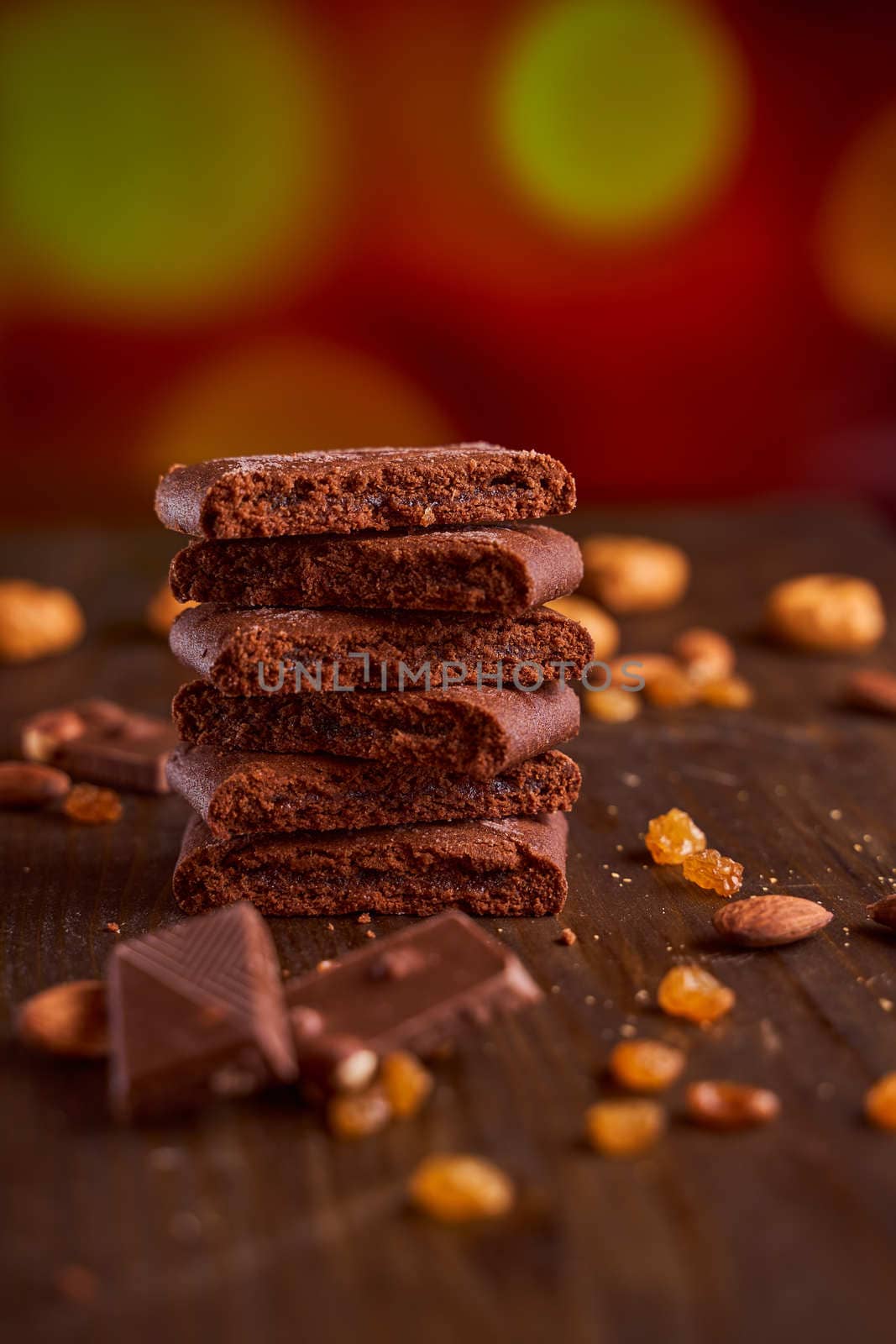 Chocolate cakes stacked on a wooden table. High quality photo