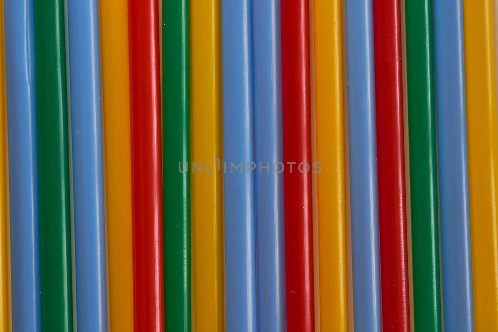 Abstract Background Multicolored Plastic Drinks Tubes. Close-up. High quality photo