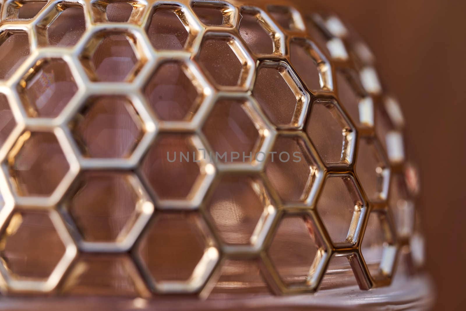 Cellular grate on glassware. Macro effect photo.Close-up. High quality photo