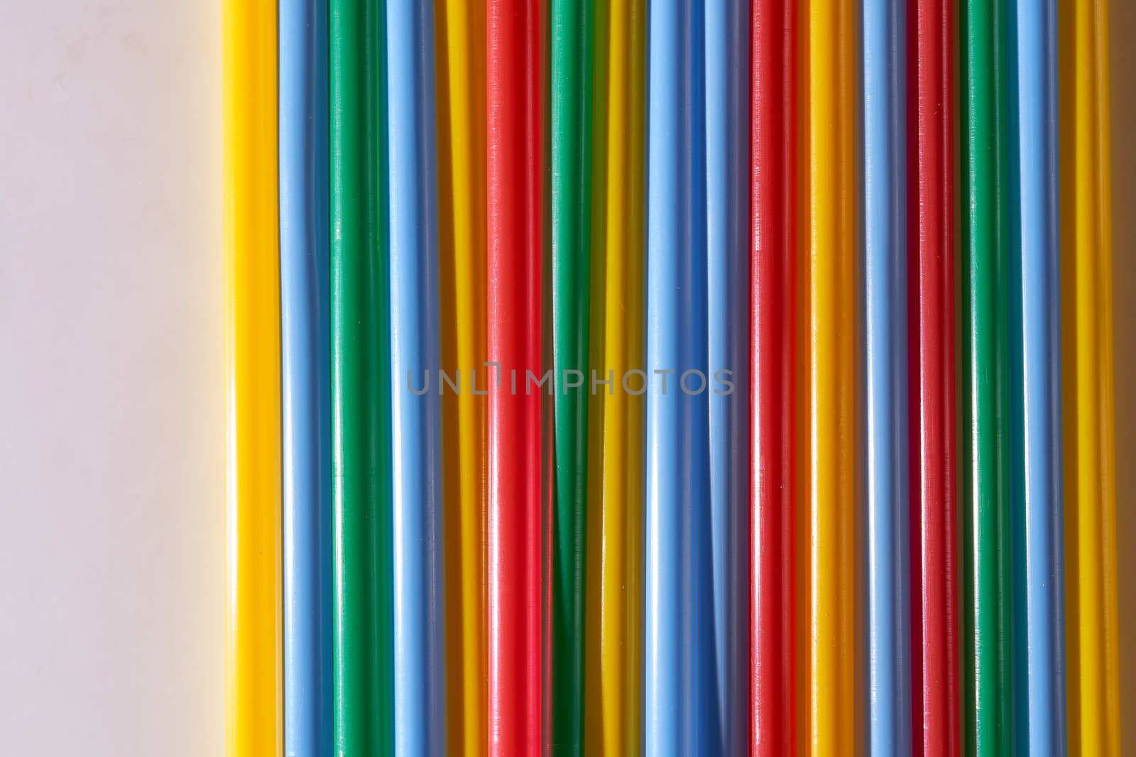 Abstract Background Multicolored Plastic Drinks Tubes. Close-up. High quality photo