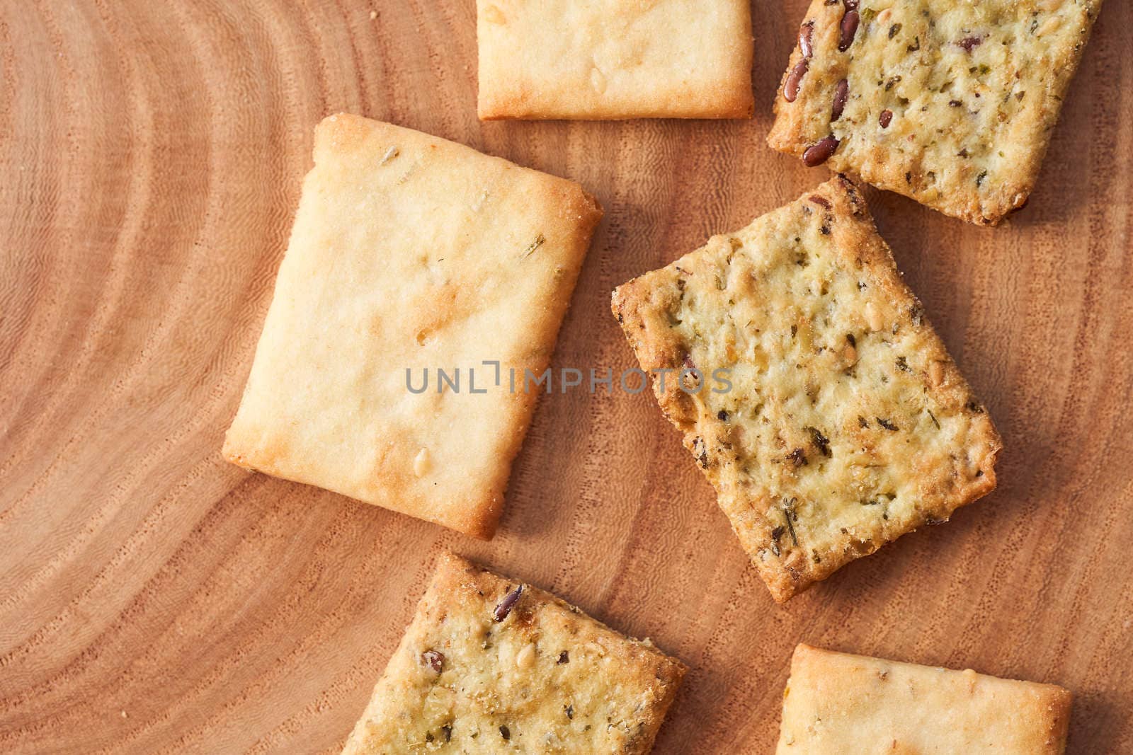 Wheat dry biscuits with spices on a wooden table . High quality photo