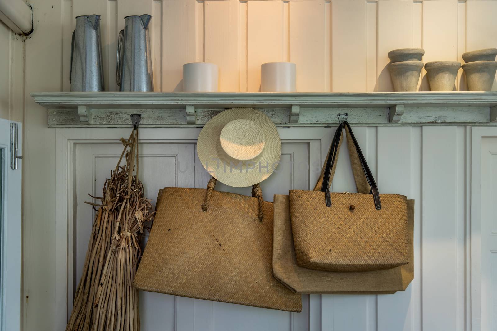 Beautiful straw hats in retro style and vintage woven handbags h by tosirikul