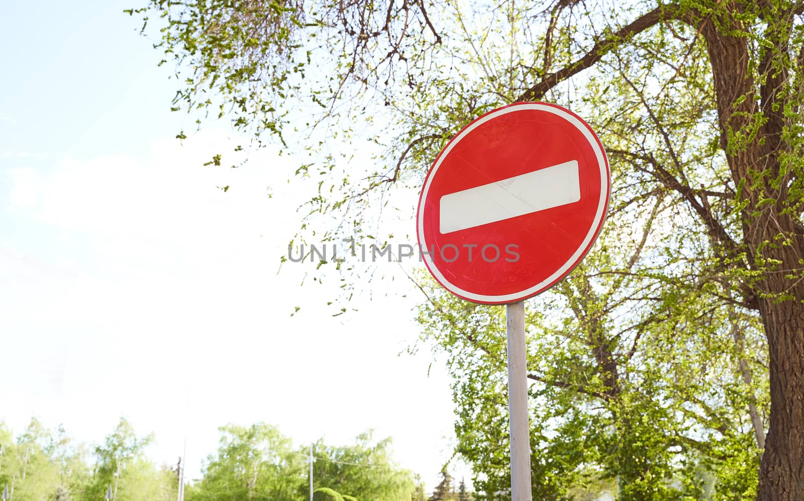 Road sign banning parking, which is pasted sign of travel ban. High quality photo