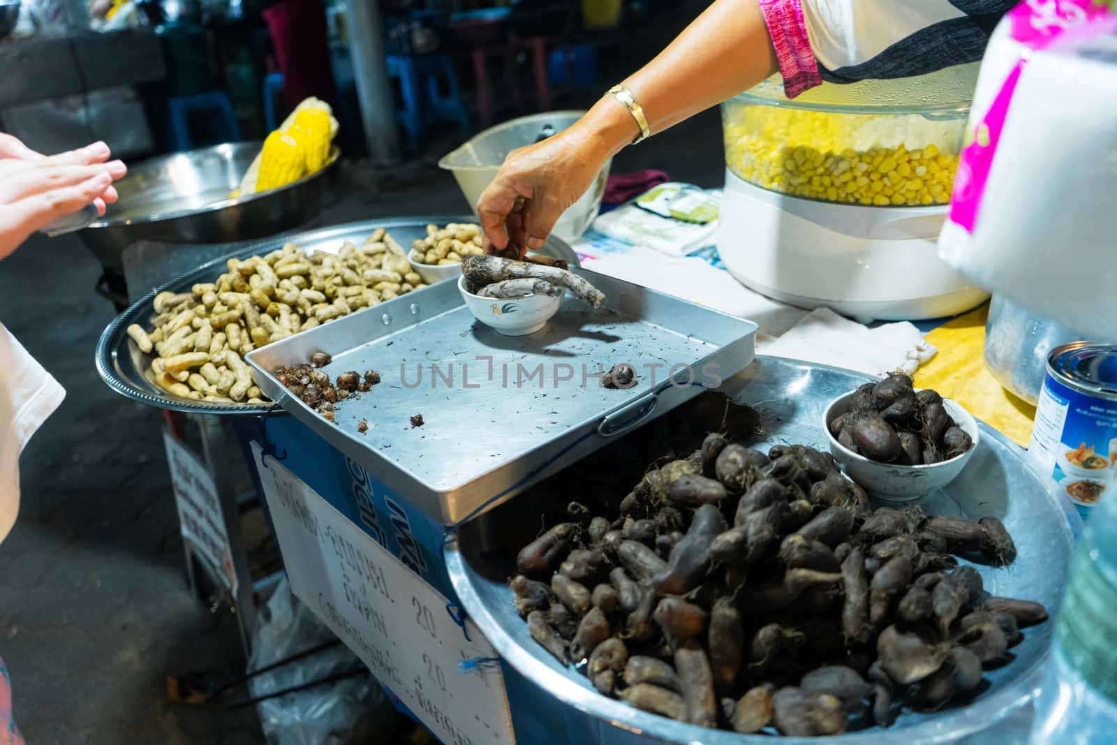 Asian street food night market. Mobile food counters. Snack Counter.