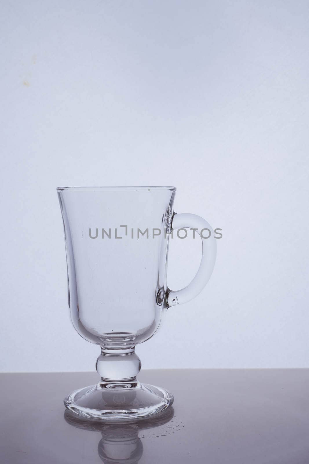 glass glass for coffee latte on a white background with a place to insert the inscription. Hight quality photo