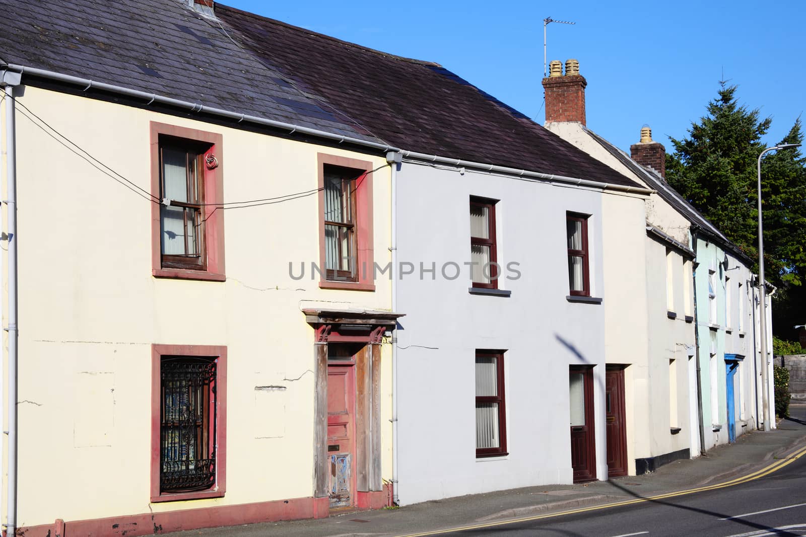 Old fashioned terraced town houses in Carmarthen Carmarthenshire Wales UK stock photo