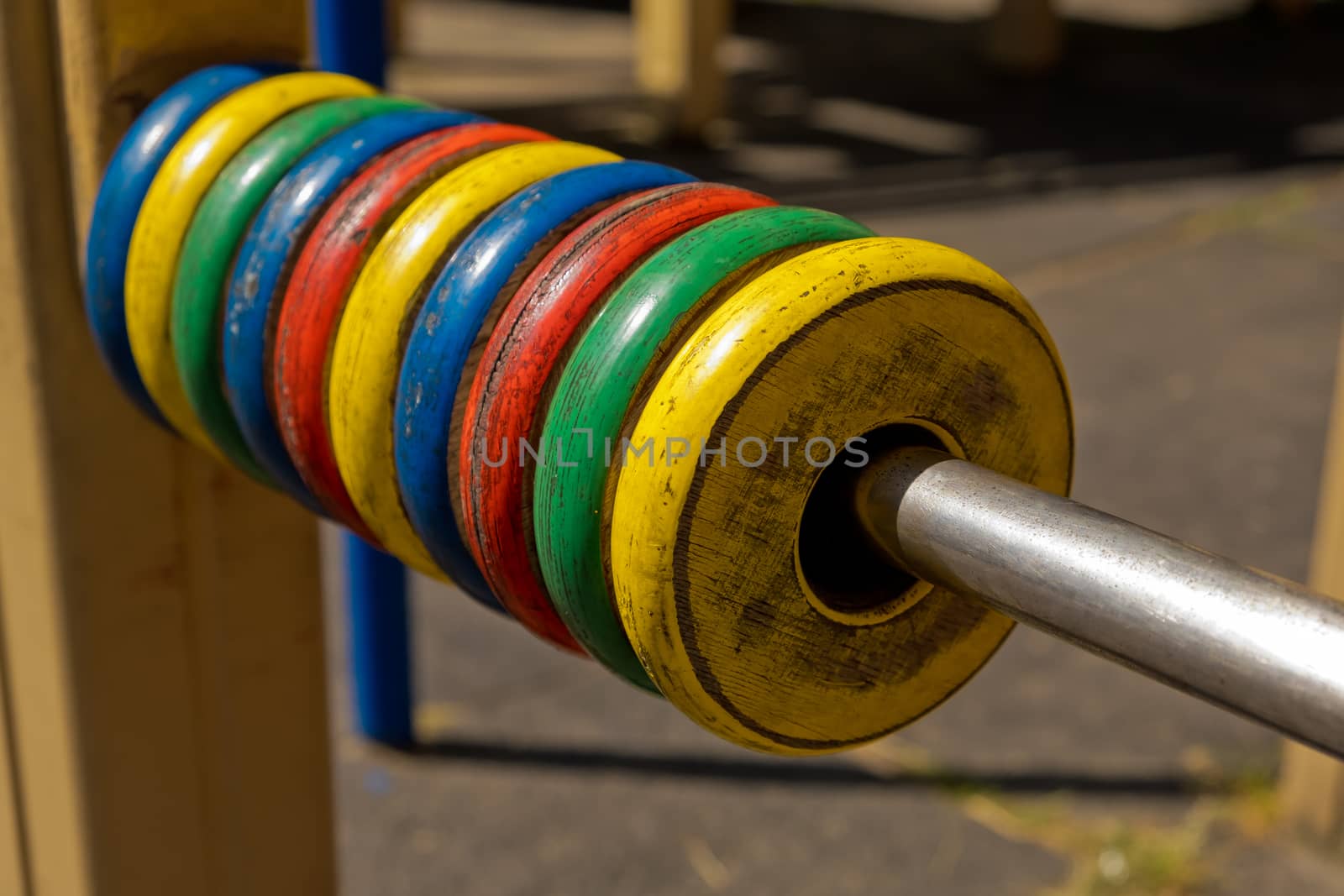 Large colored children's abacus, wooden rings. Closeup.