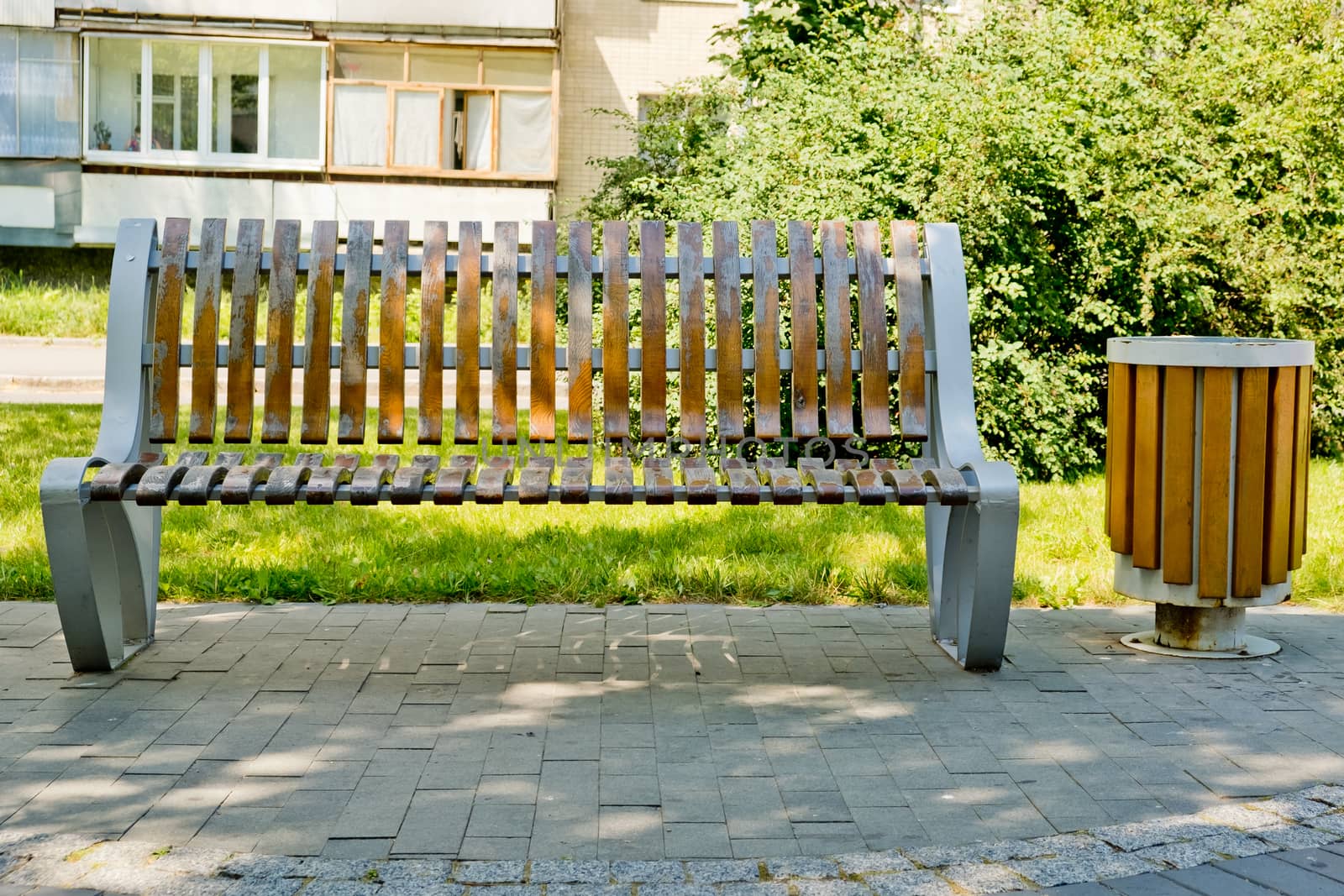 Bench on the alley in the park.