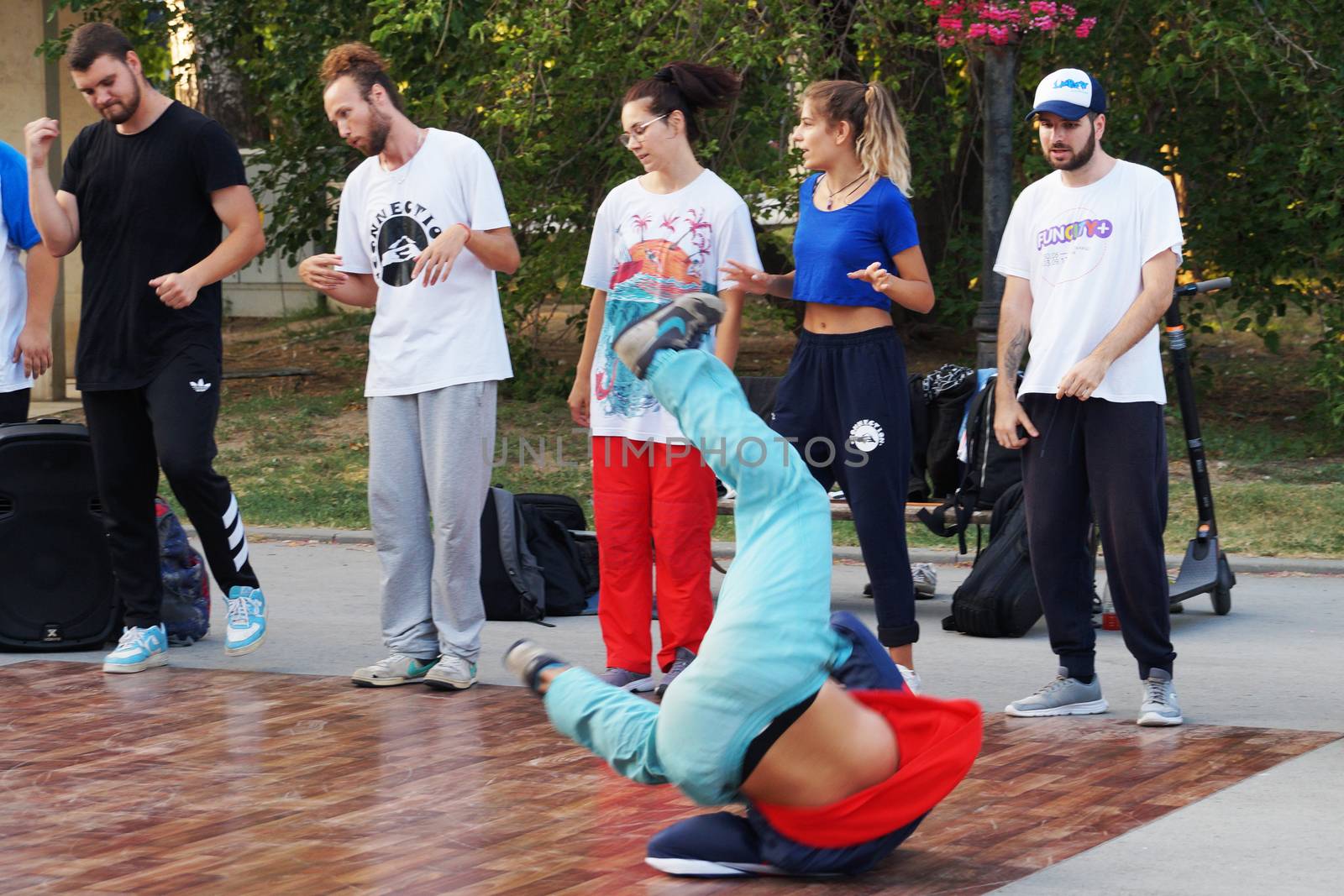 Varna, Bulgaria - July, 19, 2020: young people dancing break dance on the street of Varna