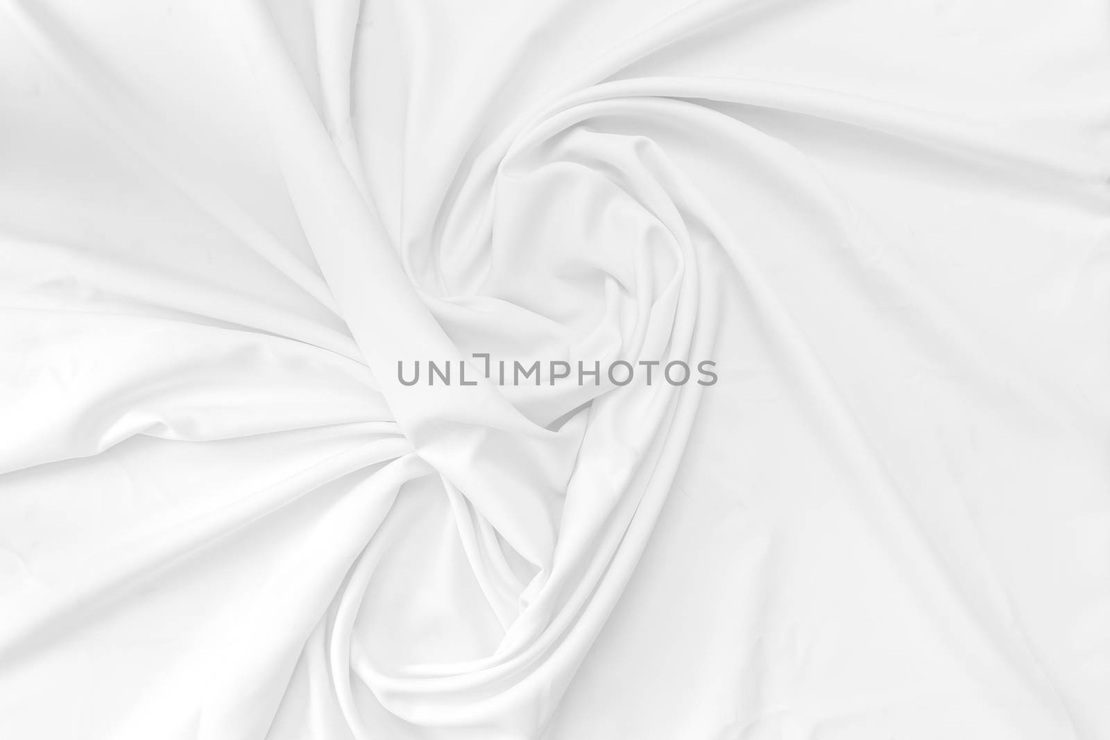 White cotton fabric texture background. Abstract white fabric with rippled background.White fabric with soft wave.  Soft focus technique. 