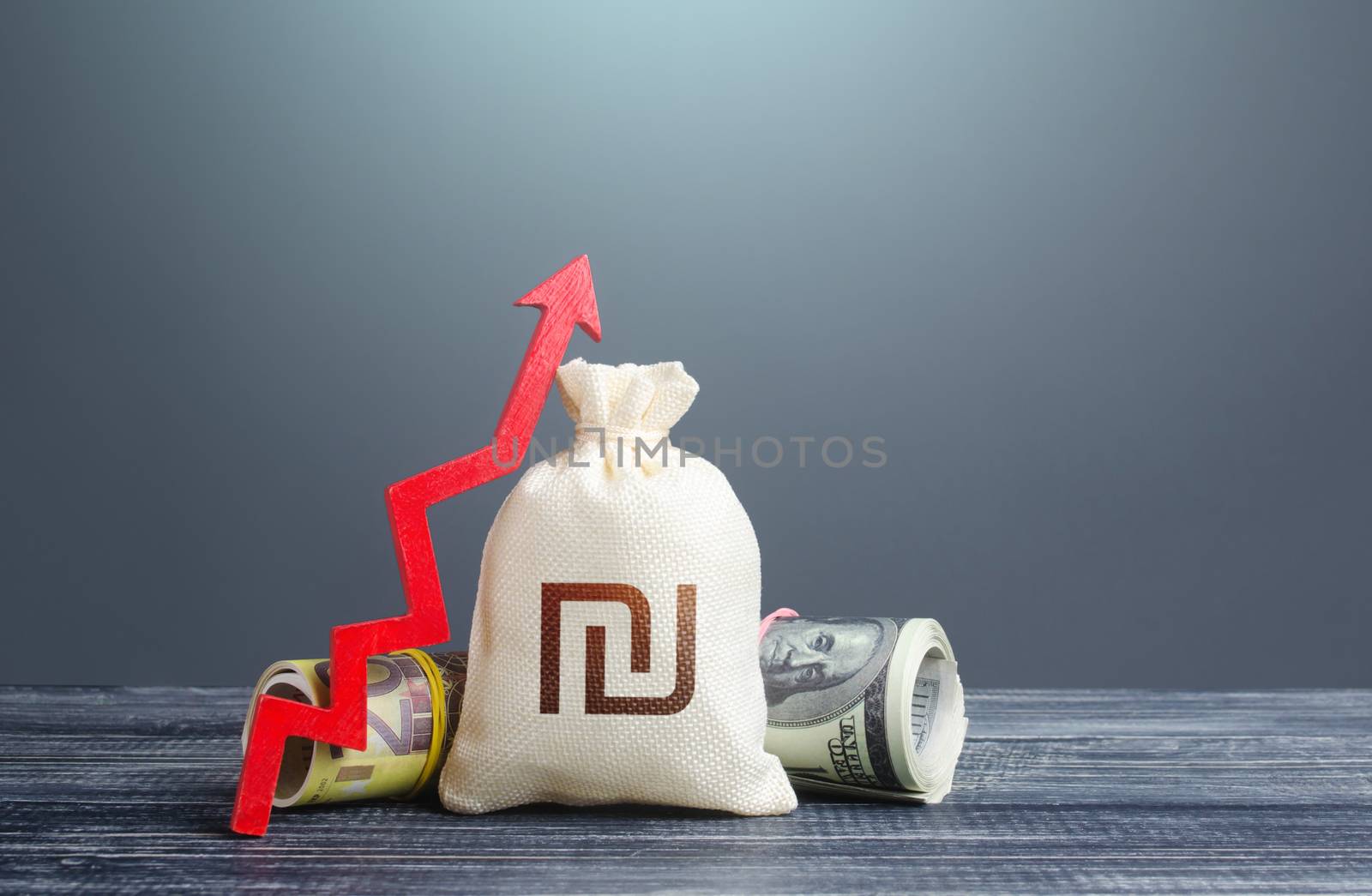 Israeli shekel money bag and red arrow up. Growth of economy and increase of investment attractiveness. Recovery. Stable currency. Rising inflation, money supply. Developing markets. Reserve fund