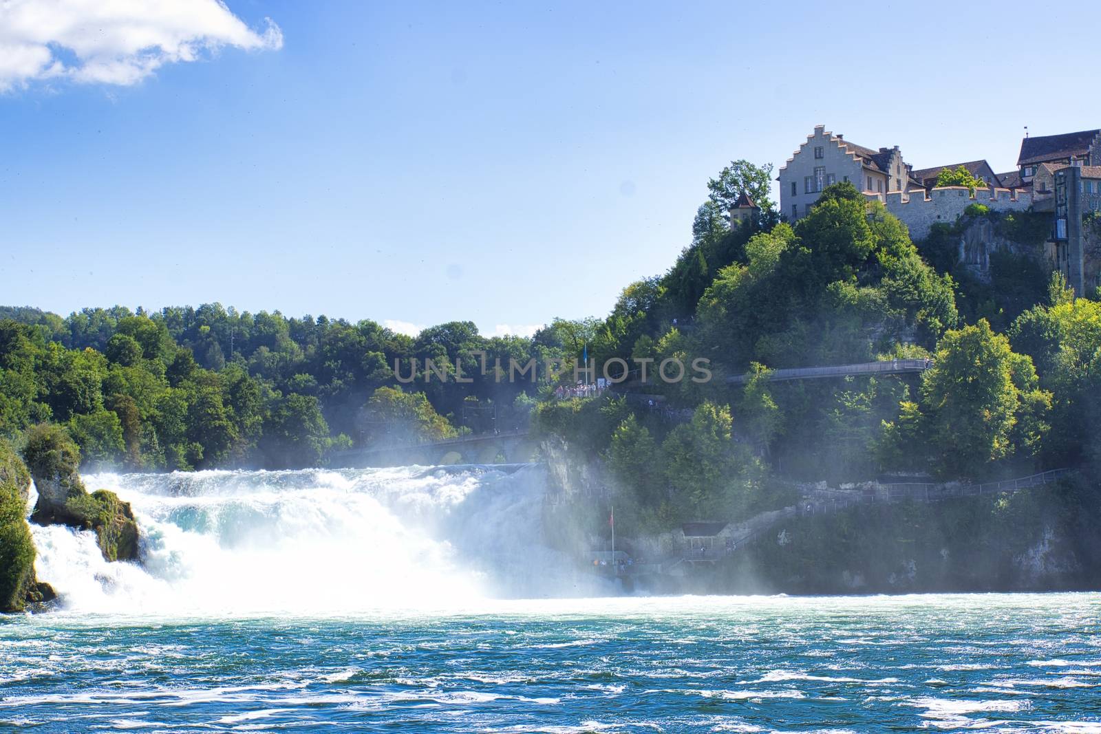 the famous rhine falls in the swiss near the city of Schaffhausen - sunny day and blue sky