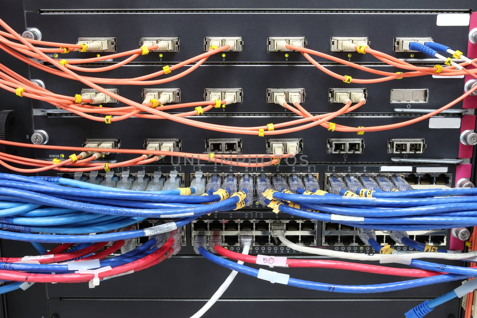 cable network, fiber optic cable connect to switch port in server room ,Concept network management
